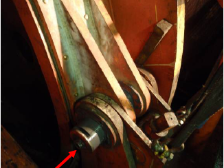 Installation of brake pin using hydraulic jack (red arrow)