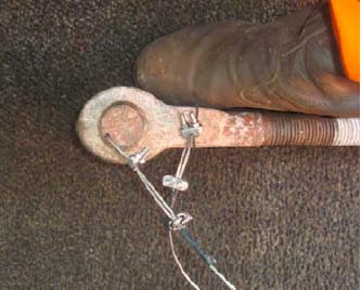 Securing of shackle pins used at height with wire