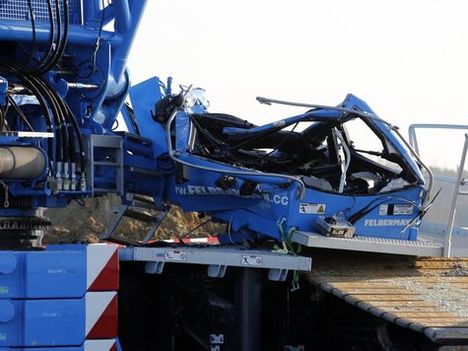Crane cab destroyed by turbine blade landing on top of it