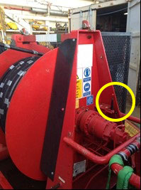 Hydraulic winch showing control lever and the guard in which the operator trapped his thumb