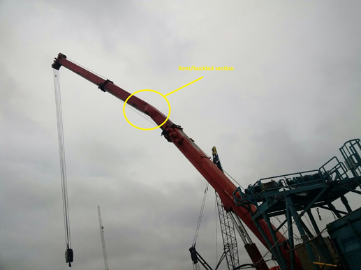 Point at which crane boom bucked (marked)